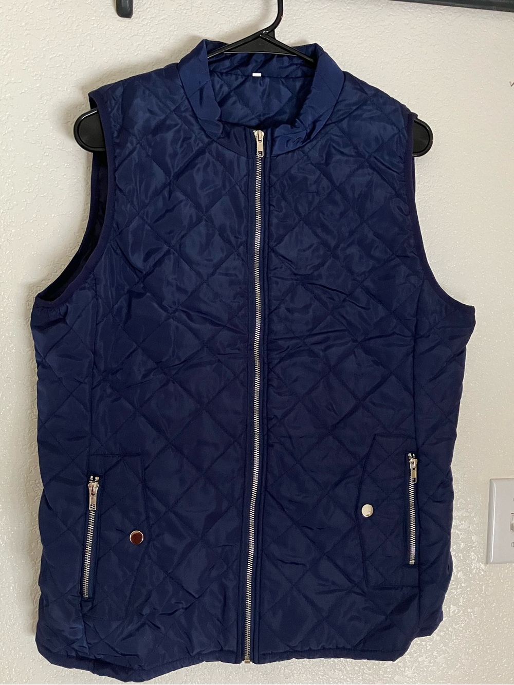 Women’s navy blue puffer vest size medium
